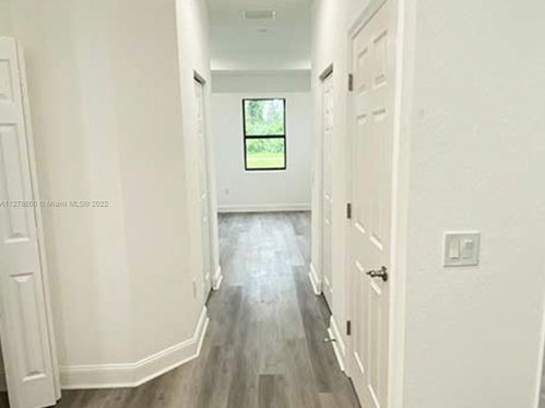 546 Aspen Ave, Lehigh Acres FL 33974-9613 exterior