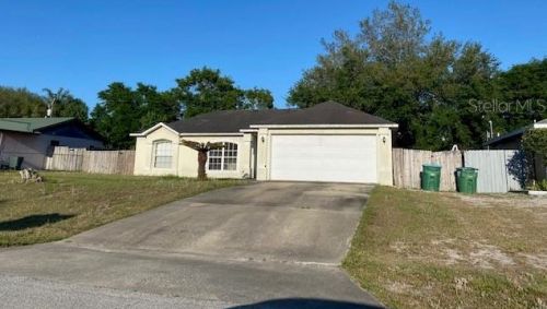 655 Staffordshire Ave, Deltona, FL 32738-9499