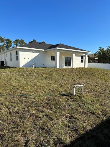 3005 2nd St, Lehigh Acres, FL 33936-1865