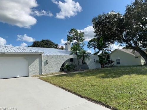 1665 Country Club Pkwy, Lehigh Acres, FL 33936-5365