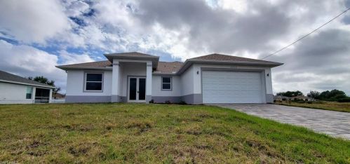2713 24th St, Lehigh Acres, FL 33971-5595
