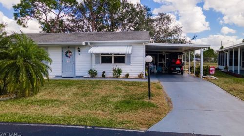 12 Heath Aster Ln, Lehigh Acres FL 33936-7347 exterior