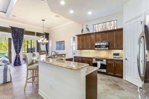 6488 Caldecott Dr, Naples FL  34113-3193 exterior