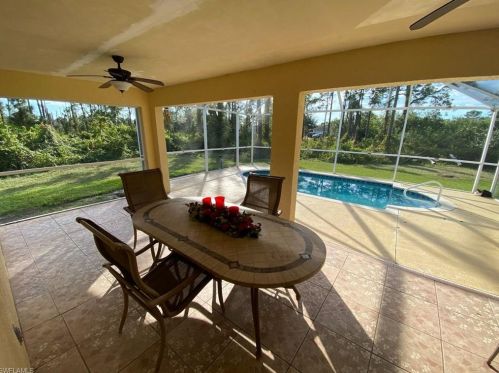 518 Aspen Ave, Lehigh Acres FL 33974-9613 exterior