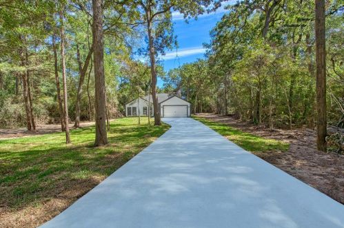12933 Mill Creek Dr, Plantersville, TX 77363-7747