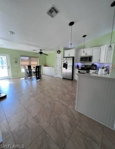 1041 Cedartree Ave, Lehigh Acres FL 33971-7590 exterior