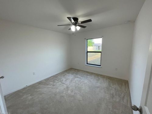 128 Shadow Lakes Dr, Lehigh Acres FL  33974-0803 exterior