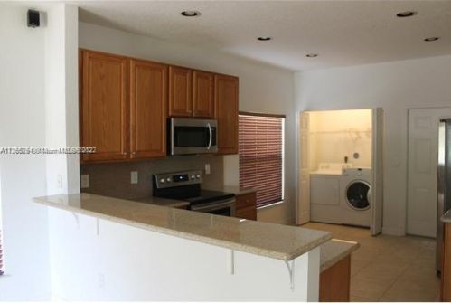3006 138th Ave, Hollywood FL  33027-3936 exterior