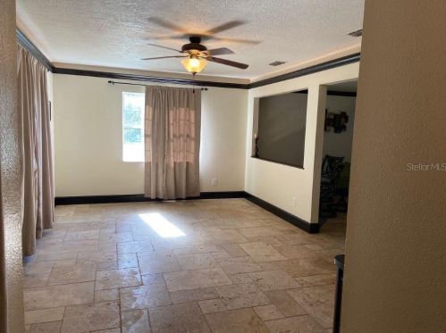 18 Cardamon Dr, Orlando, FL 32825-3658