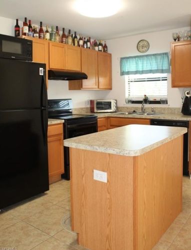 230 Shadow Lakes Dr, Lehigh Acres, FL 33974-0805