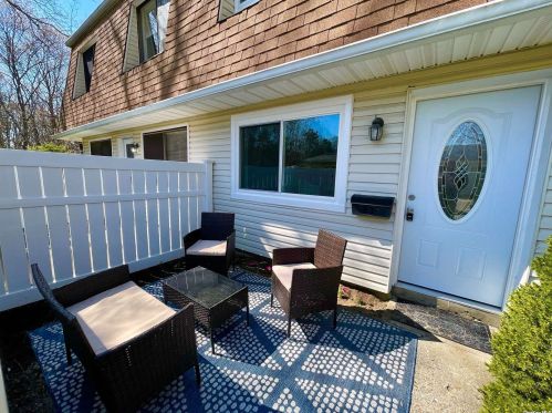 63 Storm Dr, Holtsville NY  11742-1909 exterior