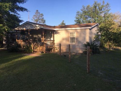 4400 Leisure Lakes Dr, Sunny Hills, FL 32428-5649
