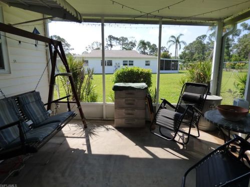 5 Meadow Rue Ct, Lehigh Acres FL  33936-7303 exterior