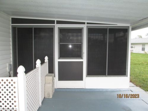 25 Dawn Flower Cir, Lehigh Acres FL 33936-7356 exterior