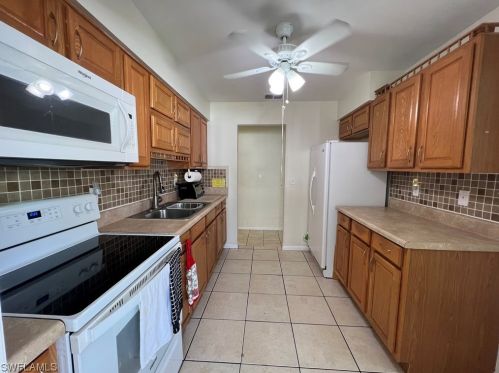 14 Desert Candle Cir, Lehigh Acres FL 33936-7360 exterior