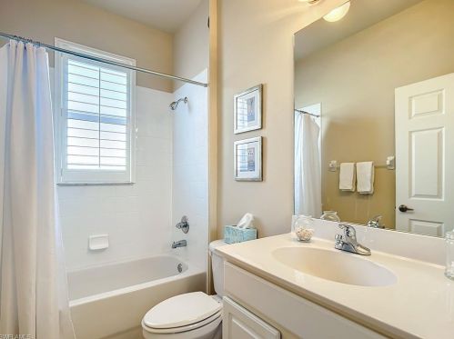 5690 Lago Villaggio Way, Naples FL  34104-5739 exterior