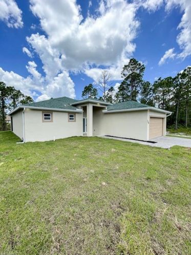 746 Jaguar Blvd, Lehigh Acres, FL 33974-5755