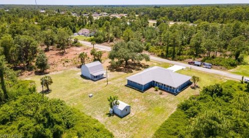 1216 Robert Ave, Lehigh Acres FL 33972-1712 exterior