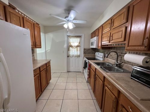 14 Desert Candle Cir, Lehigh Acres FL 33936-7360 exterior