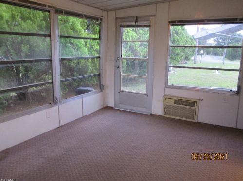 1 Hamlin Ct, Lehigh Acres FL 33936-7211 exterior