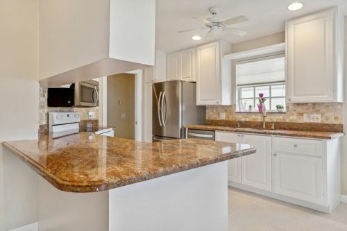 7718 Pine Island Way, West Palm Beach FL  33411-5802 exterior