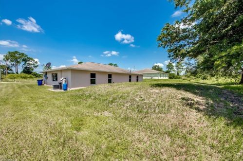 217 Ivan Ave, Lehigh Acres FL 33973-2011 exterior