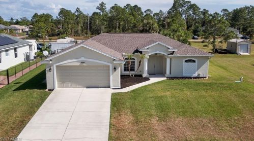 1054 Grant Blvd, Lehigh Acres, FL 33974-4748