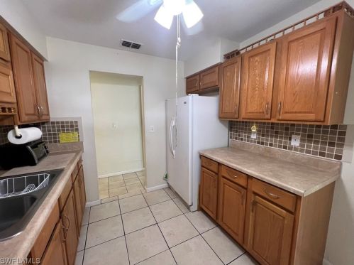 14 Desert Candle Cir, Lehigh Acres FL 33936-7360 exterior