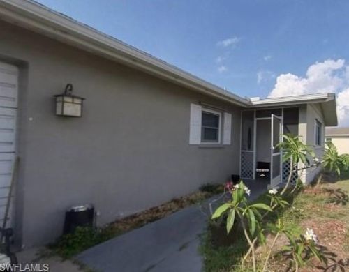 129 Lake Dr, Lehigh Acres, FL 33936-6907