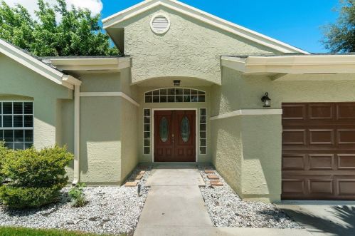 1112 Wild Cherry Ln, West Palm Beach FL  33414-7904 exterior