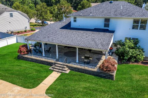 142 Serpentine Dr, Morganville NJ  07751-1400 exterior