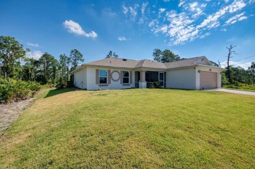 927 Flanders St, Lehigh Acres, FL 33974-7572