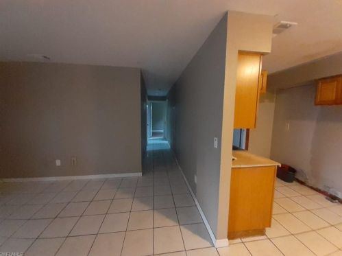 1114 Cherokee Ave, Lehigh Acres FL 33936-6856 exterior