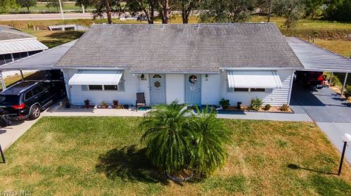 12 Heath Aster Ln, Lehigh Acres FL 33936-7347 exterior