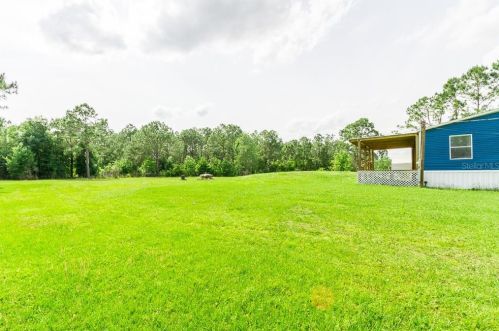 3207 Cypress Trails Dr, Polk City FL  33868-9487 exterior