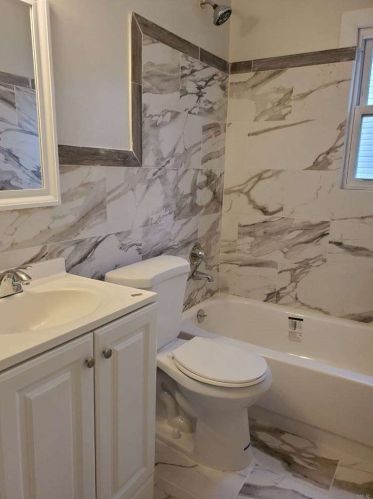 11 Grant St, Roosevelt, NY 11575-2216