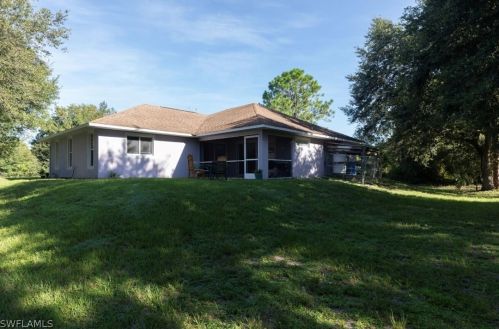 563 Flamingo Ave, Lehigh Acres FL 33974-7509 exterior