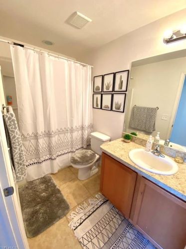 354 Shadow Lk Dr, Lehigh Acres FL 33974-0826 exterior