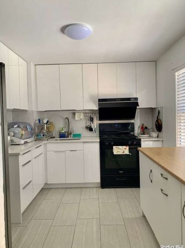 86-28 77th St, Jamaica, NY 11421-1033