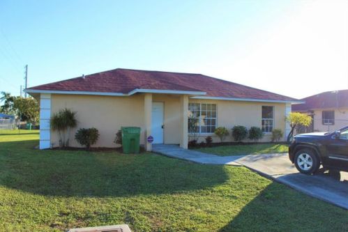 302 Amaryllis Ct, Pahokee, FL 33476-2212