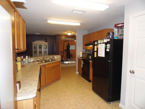 213 Shadow Lakes Dr, Lehigh Acres FL  33974-0806 exterior