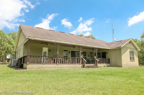 1910 Saratoga Farms Trl, De Leon Springs, FL 32130-4077