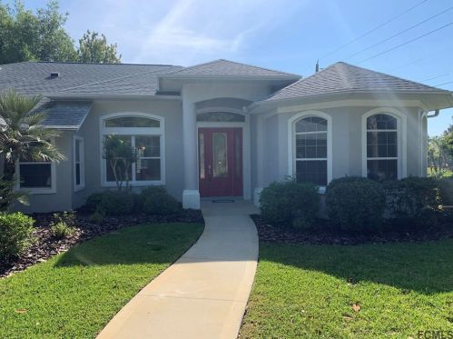 97 Ethan Allen Dr, Palm Coast, FL 32164-2907