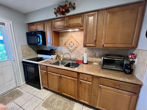 28 Desert Candle Cir, Lehigh Acres FL 33936-7362 exterior