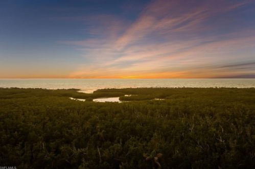 6075 Pelican Bay Blvd, Naples FL  34108-8169 exterior