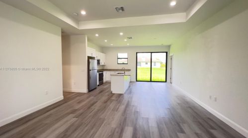 546 Aspen Ave, Lehigh Acres FL 33974-9613 exterior