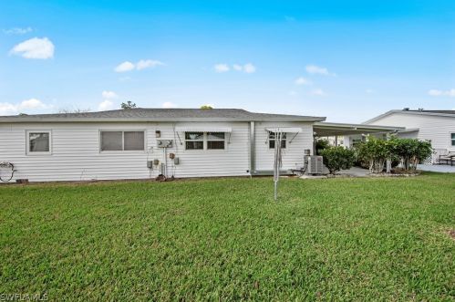 18 Dawn Flower Cir, Lehigh Acres FL 33936-7355 exterior