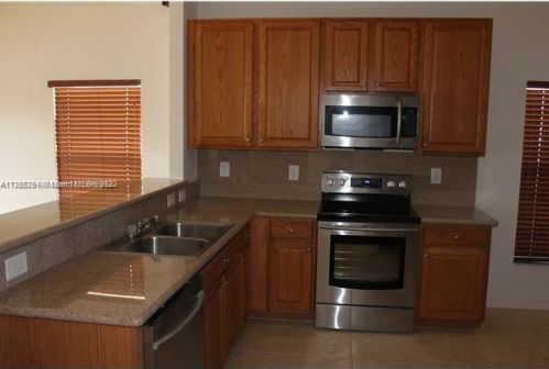 3006 138th Ave, Hollywood FL  33027-3936 exterior