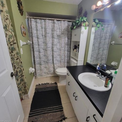 702 Thompson Ave, Lehigh Acres FL 33972-3312 exterior