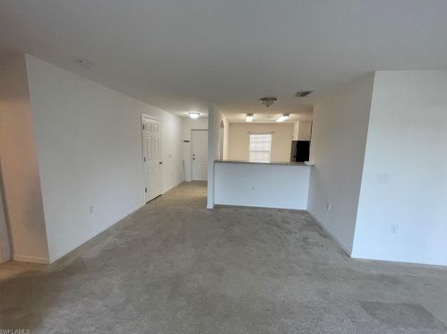 128 Shadow Lakes Dr, Lehigh Acres FL  33974-0803 exterior